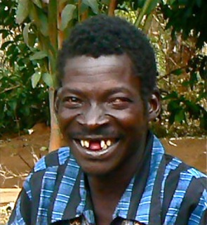 Charles' face posing on his new wheelchair